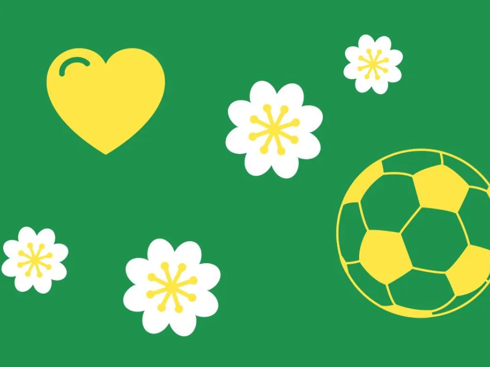Grön platta med hjärta, blommor och fotboll