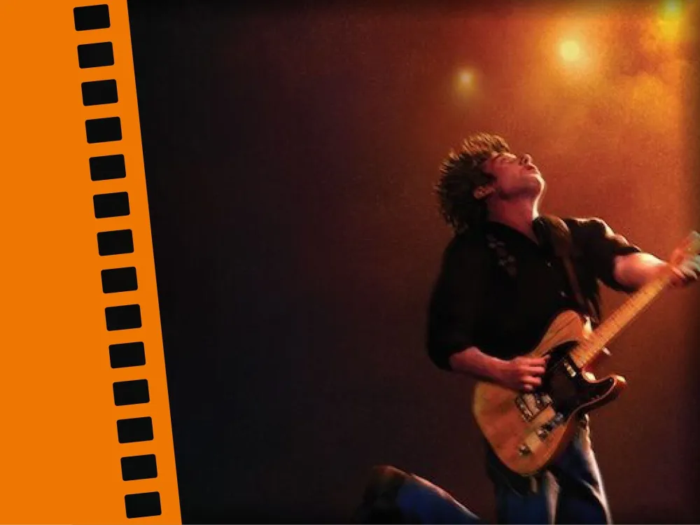 Man med elgitarr